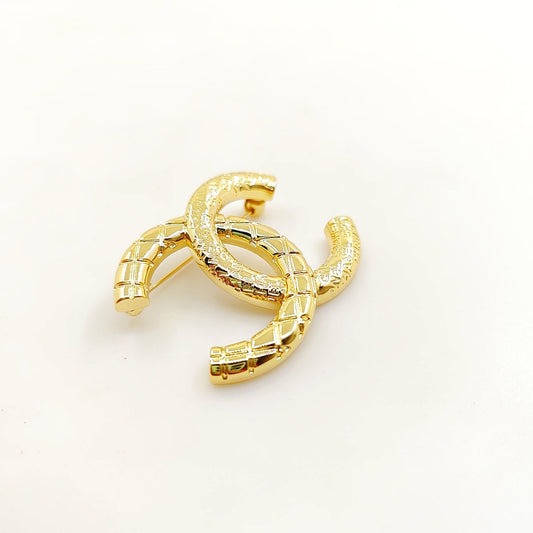 18K Chanel 24S Brooch