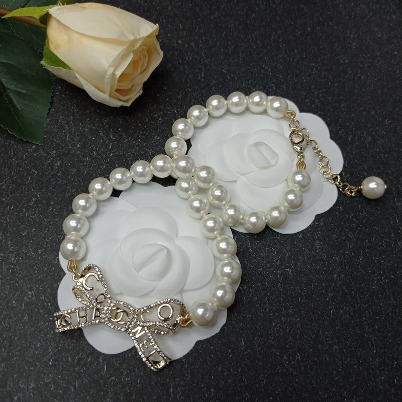 18K Chanel Bow Pearl Necklace