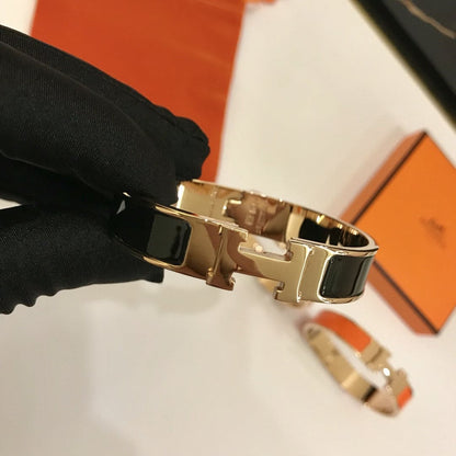 18K Clic Hermes Black Bracelet