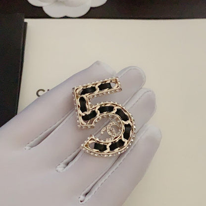 18K  Chanel No.5 Leather Diamond Brooch