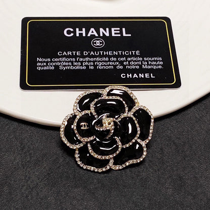 18K  Chanel Black Flower Brooch