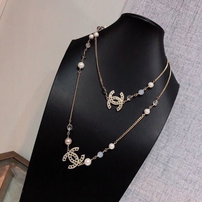 18K  Chanel Long Pearl Necklace