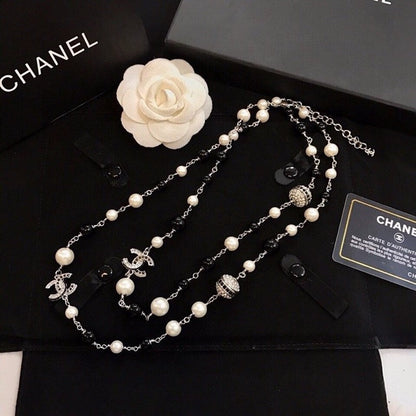 18K  Chanel Long Black Pearl Necklace