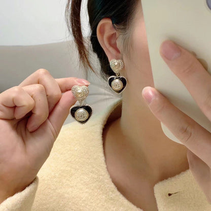 18K  Chanel Black Heart Earrings