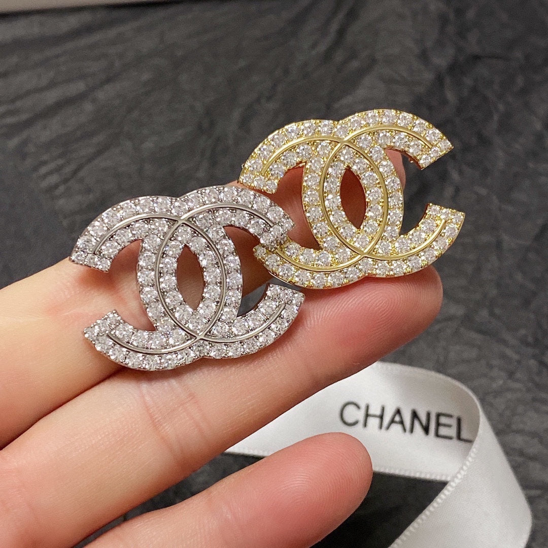 18K  Chanel Diamonds Set Broochs