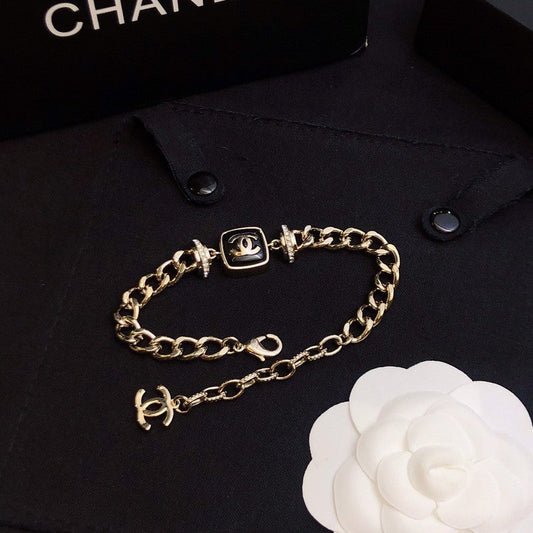 18K  Chanel Black Logo Gold Chain Bracelet