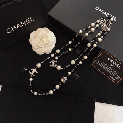 18K  Chanel Long Black Pearl Necklace