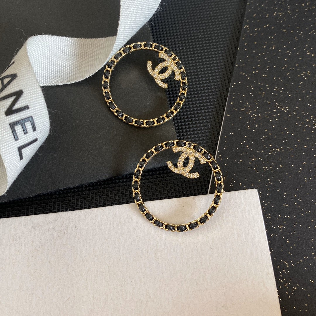 18K  Chanel Black Leather Circle Earrings