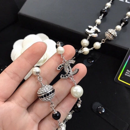 18K  Chanel Long Black Pearl Necklace