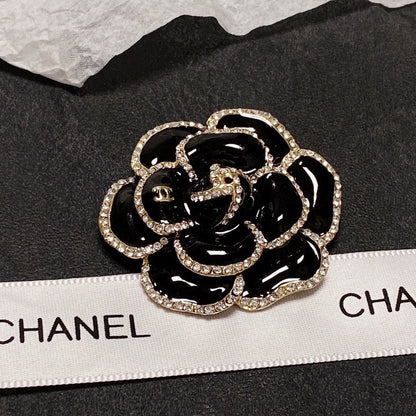 18K  Chanel Black Flower Brooch