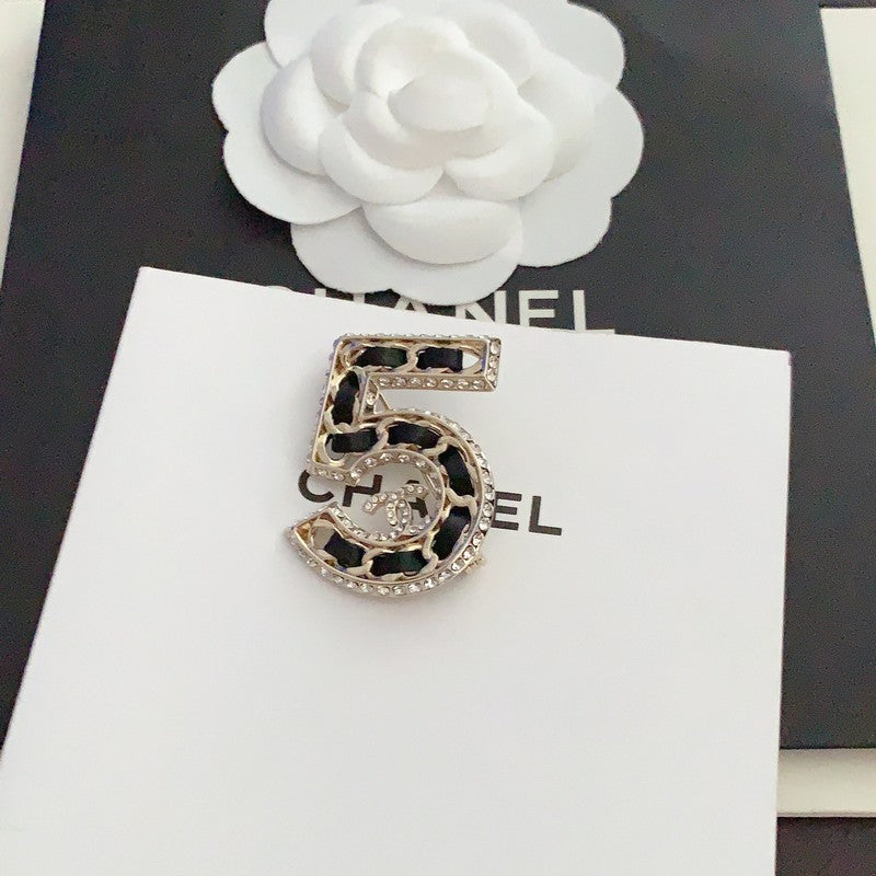 18K  Chanel No.5 Leather Diamond Brooch