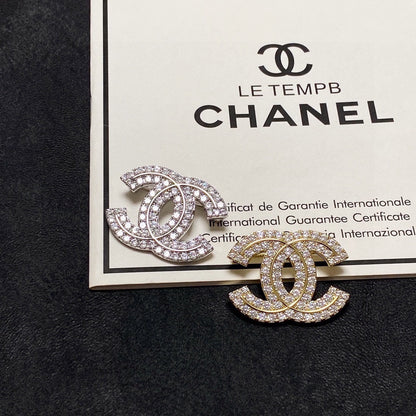 18K  Chanel Diamonds Set Broochs