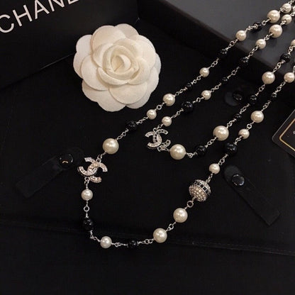18K  Chanel Long Black Pearl Necklace