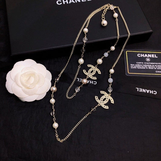18K  Chanel Long Pearl Necklace