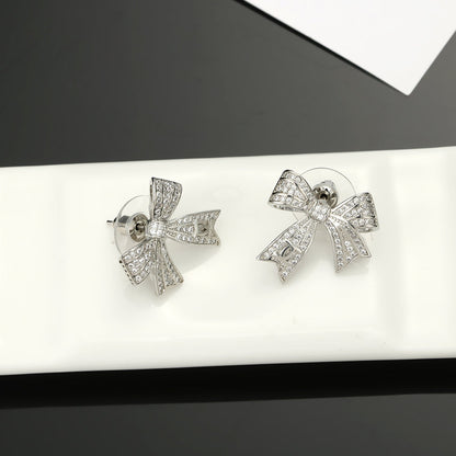 18K  Chanel Bow Tie Diamond Earrings