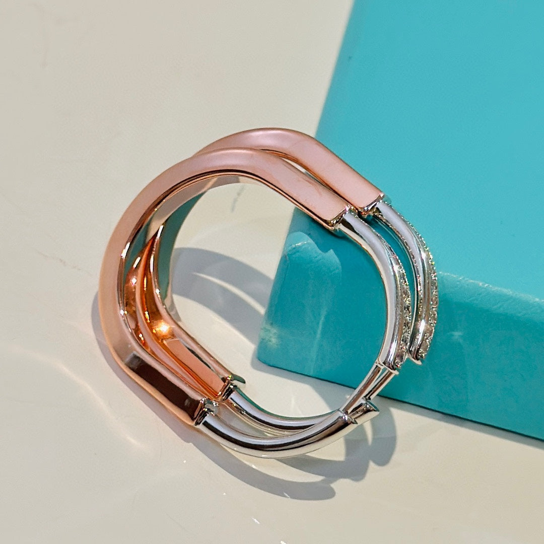 18K Tiffany Lock Diamond Earrings