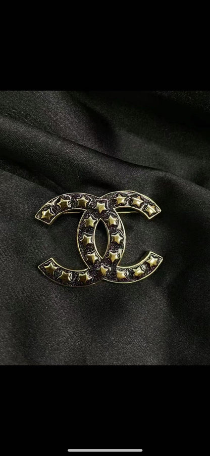 18K  Chanel Black Star Brooch