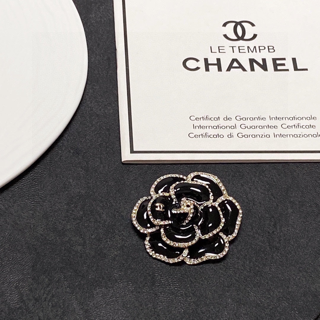18K  Chanel Black Flower Brooch
